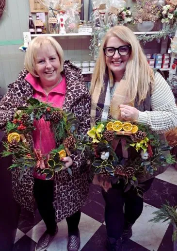 Festive Wreath Making workshop Liverpool at Booker Flowers and Gifts. Christmas wreath class in Liverpool with local flower school.